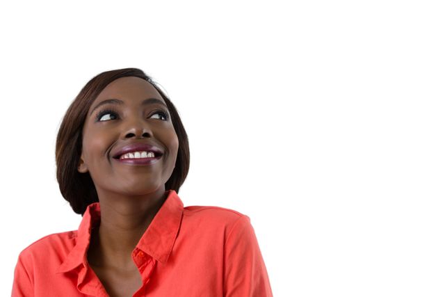 Close up of happy woman looking away against white background