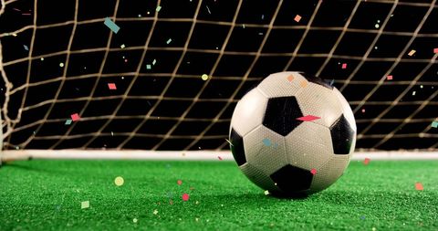 Soccer Ball on Field Celebrating Victory with Confetti - Download Free Stock Images Pikwizard.com