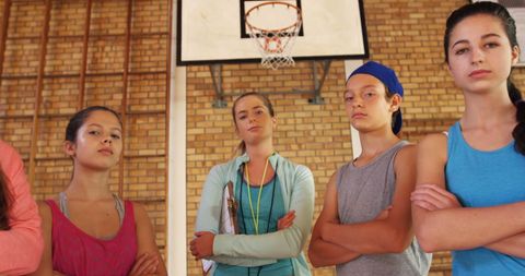 Confident High School Basketball Team with Female Coach - Download Free Stock Images Pikwizard.com