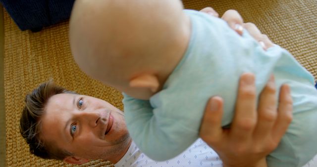 Father Spending Quality Time with Baby Indoor - Download Free Stock Images Pikwizard.com