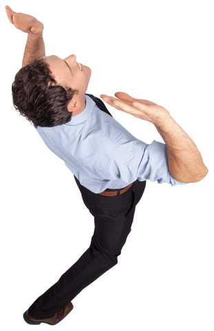 Businessman in unique clear pose with arms raised