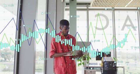 Digital Data Analytics with Young Professional Collaborating at Office