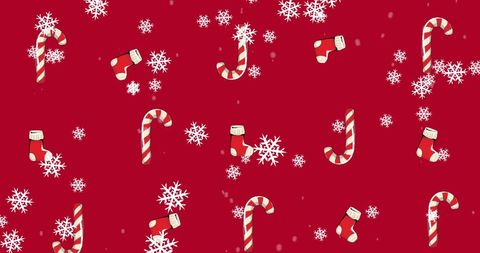 Festive candy canes and stockings pattern on red background