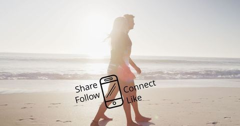 Couple walking on beach with social media overlay concept