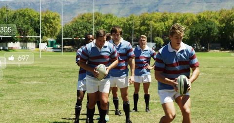 Rugby Team Practicing Ball Drill on Sunny Grass Field Wearing Blue Maroon Striped Jerseys