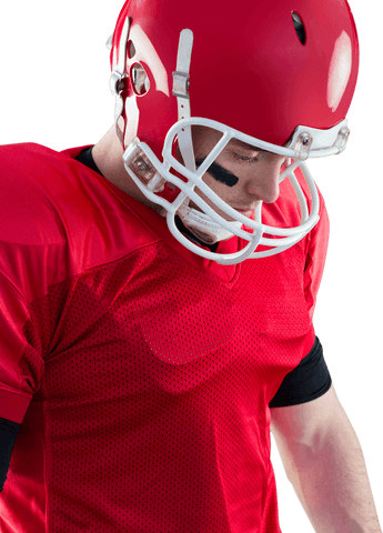 Transparent image of american football player in focused moment