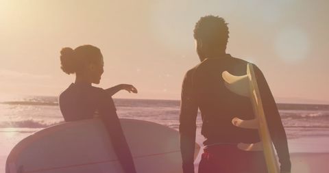 Couple Enjoying Surf Day at Ocean - Download Free Stock Images Pikwizard.com