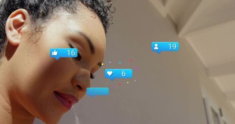 Tilting woman lowering gaze with floating social media notification bubbles