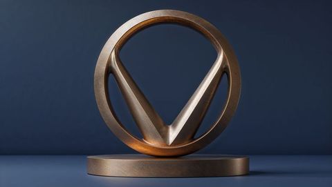 Contemporary bronze-tone sculpture with v-shape on blue background