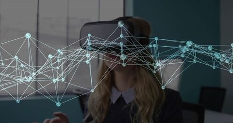 Businesswoman Engaging with Virtual Network through VR Headset in Office