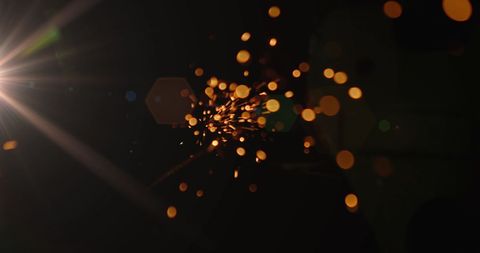 Sparks Flying in Darkness Creating Dynamic Abstract Effect - Download Free Stock Images Pikwizard.com