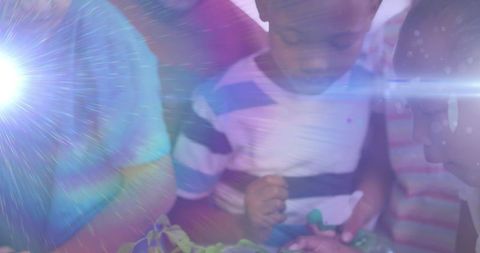 Diverse Schoolchildren Engaged in Hands-on Plant Learning