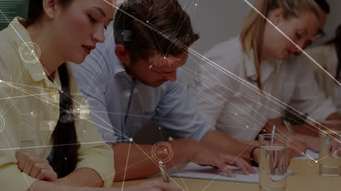 Diverse Professionals Analyzing Animated Data Interface Working Together