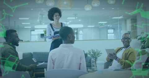 Team Collaboration in Modern Office Lounge with Smiling Professionals