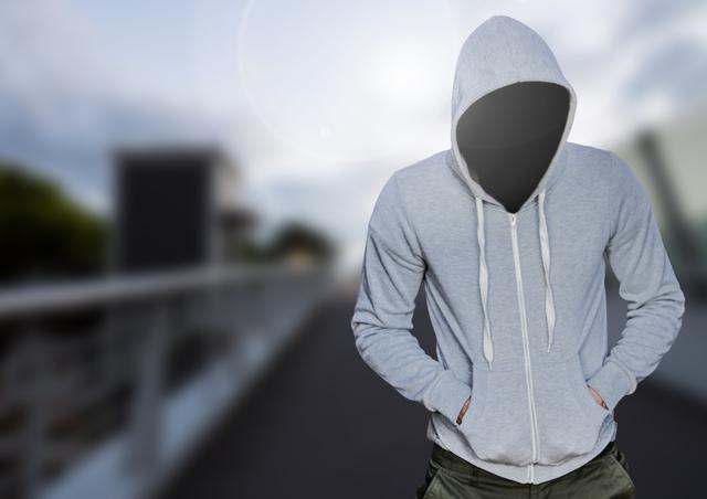 Digital composite of Anonymous Criminal in hood in front of bridge