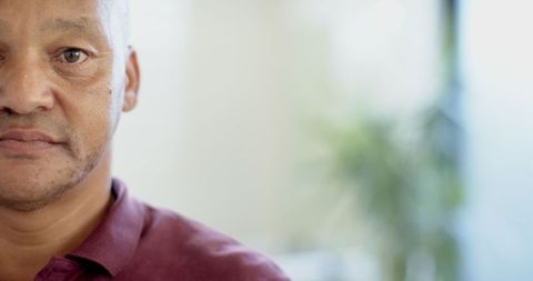 Senior Man Gazing Thoughtfully Wearing Casual Polo