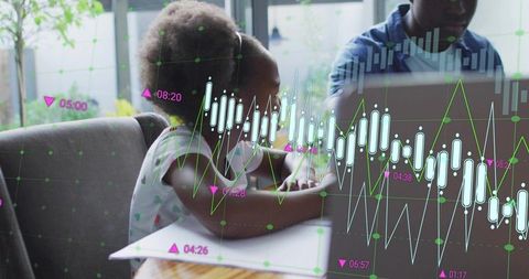 Young black girl studying at home with laptop and data overlay reflecting remote learning