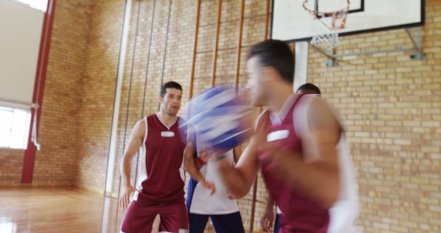 Men Playing Basketball Game Indoors with Brick Wall - Download Free Stock Images Pikwizard.com