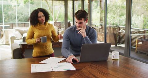 Diverse Couple Enjoying Time Together Paying Bills - Download Free Stock Images Pikwizard.com