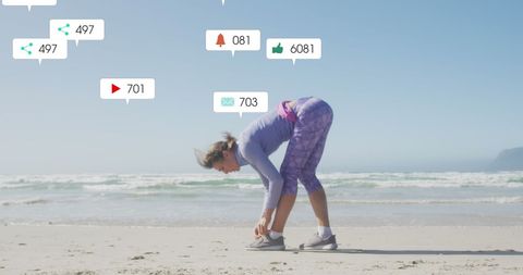 Caucasian Woman Stretching with Social Media Icons on Beach