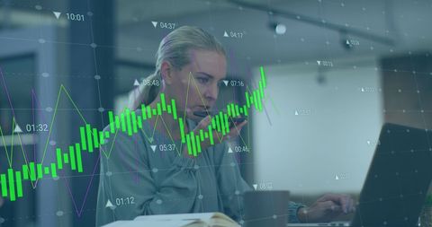 Businesswoman Analyzing Data with Phone and Laptop in Modern Office - Download Free Stock Images Pikwizard.com