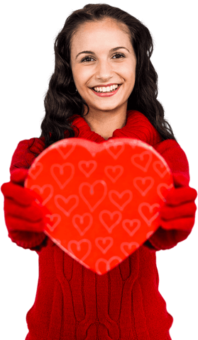 Smiling woman in red holding transparent heart shape box