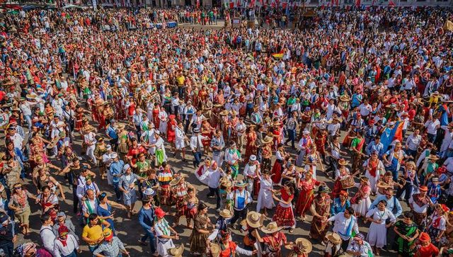 Cultural festivities with traditional folk dance in town square