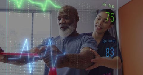 Patient with Doctor Using Digital Heart Rate Display