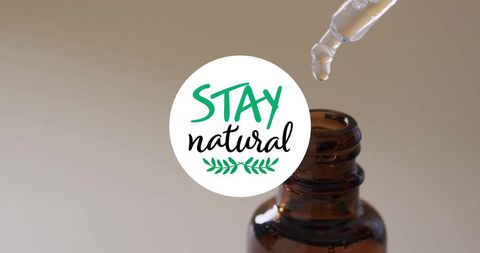 Stay natural message with essential oil dropper