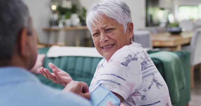 Senior Woman Reacting to Blood Pressure Measurement at Home - Download Free Stock Images Pikwizard.com