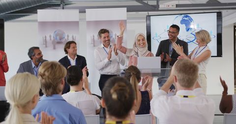 Celebrating Success at Business Conference with Diverse Team - Download Free Stock Images Pikwizard.com