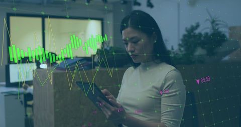 Businesswoman analyzing financial data on digital device