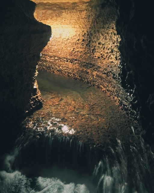 Mesmerizing Underground Waterfall Inside Cave - Download Free Stock Photos Pikwizard.com