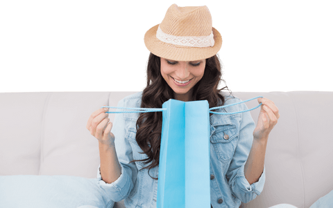 happy woman opening gift on couch isolated transparent background - Download Free Stock Videos Pikwizard.com