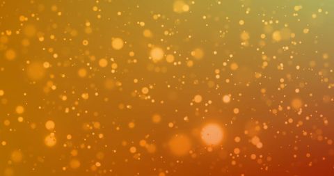 Orange Glowing Abstract Background with Light Particles