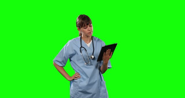 Young Nurse Using Tablet with Green Screen Background - Download Free Stock Images Pikwizard.com