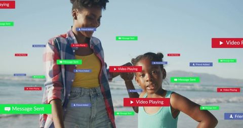 Child and adult enjoying beach while social media notifications floating across coastal scene