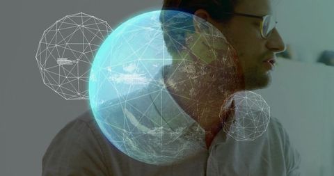 Businessman interacting with futuristic digital globe interface