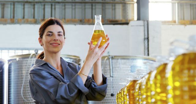 Female Quality Control Worker Analyzing Olive Oil in Factory - Download Free Stock Images Pikwizard.com