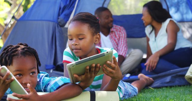 African American Family Bonding During Camping While Using Digital Tablets - Download Free Stock Images Pikwizard.com