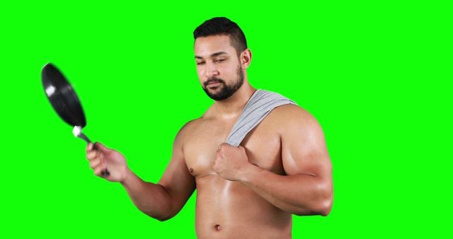 Muscular Man Holding Frying Pan on Green Screen Background - Download Free Stock Images Pikwizard.com