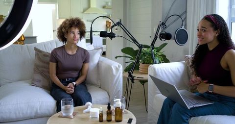 Recording Intimate Podcast Interview in Cozy Home Studio with Two Female Hosts Discussing Skincare