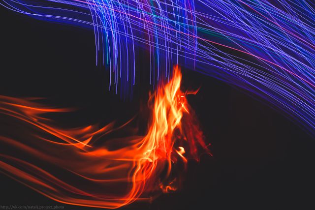Abstract Light Trails and Flames in Dark Background - Download Free Stock Photos Pikwizard.com