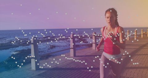 Fit Woman Running Along Waterfront Promenade During Sunset