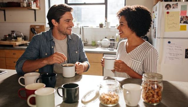 Sharing morning coffee and conversation at cozy kitchen island