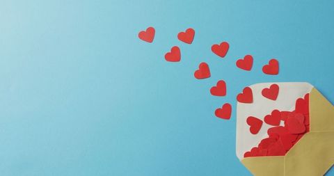 Envelope Releasing Red Paper Hearts on Blue Background - Download Free Stock Images Pikwizard.com