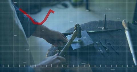 Precision craftsmanship: artisan hammering chisel on tile