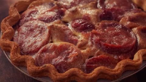 Rustic Tomato Tart with Fluted Crust on Wooden Table
