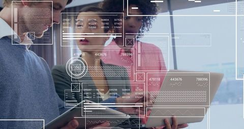 Collaborative Team Analyzing Interactive Data Overlays on Tablet and Laptop in Urban Office