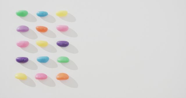 Colorful Jelly Beans Arranged in Rows on White Background - Download Free Stock Images Pikwizard.com